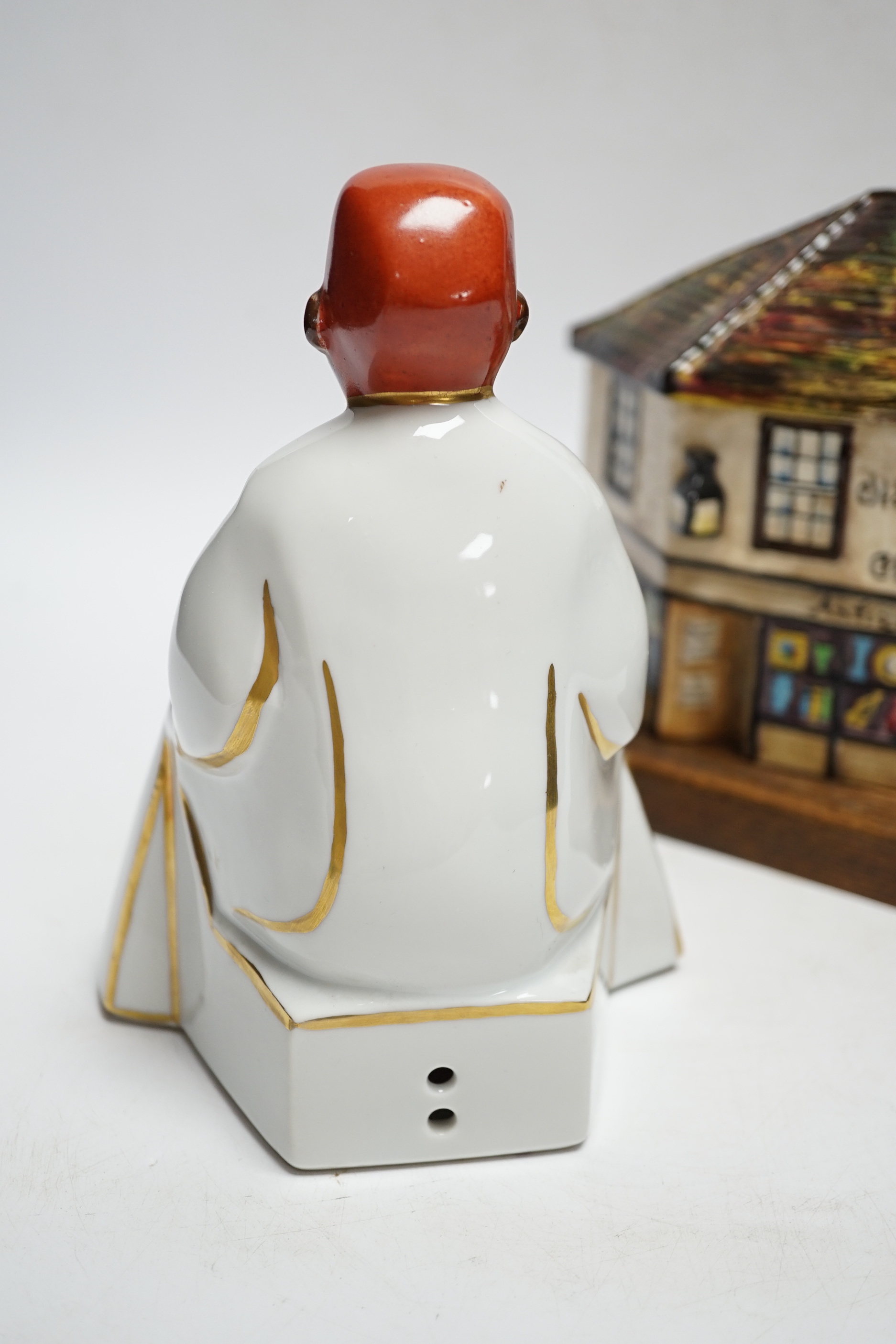 Two Art Deco ceramic lamps, a Limoges parfume lamp and a Goldscheider 'Old Curiosity Shop', highest 21cm